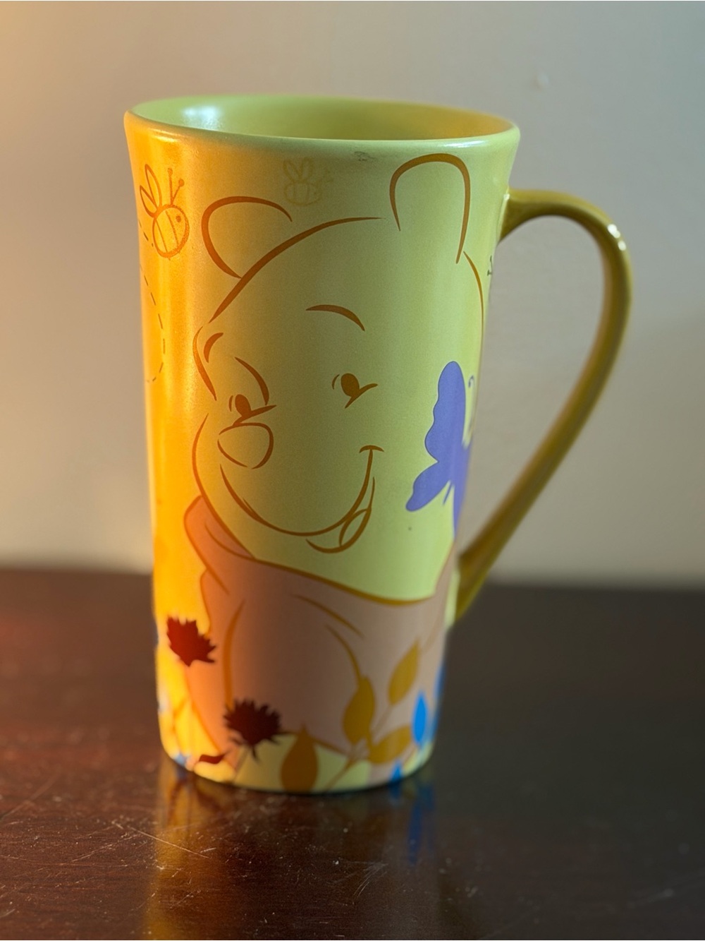 vintage Disney Store Winnie the Pooh "Flowers and Butterflies" tall latte mug